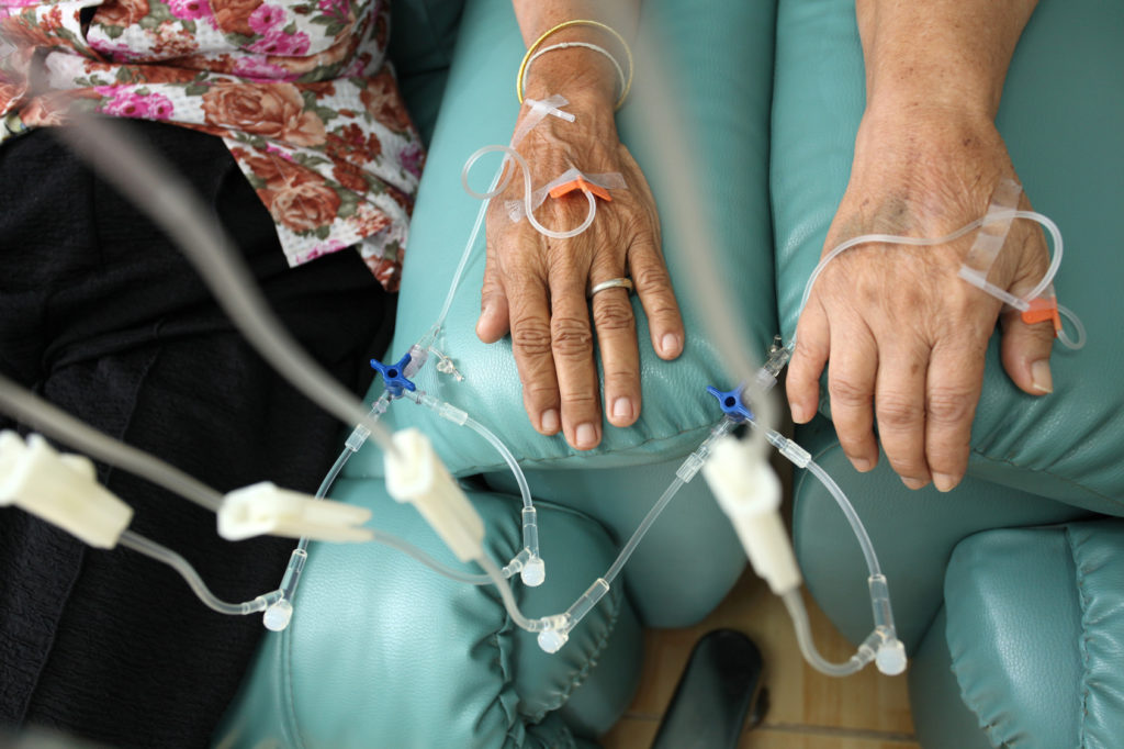 Patients getting intravenous solution for chemotherapy